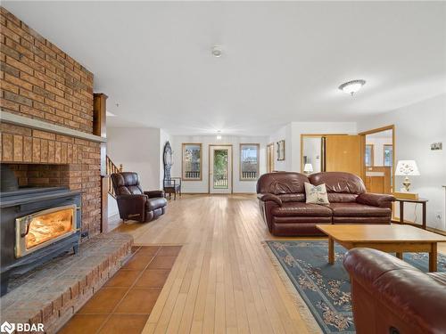 74 Line 15 N, Oro-Medonte, ON - Indoor Photo Showing Living Room With Fireplace