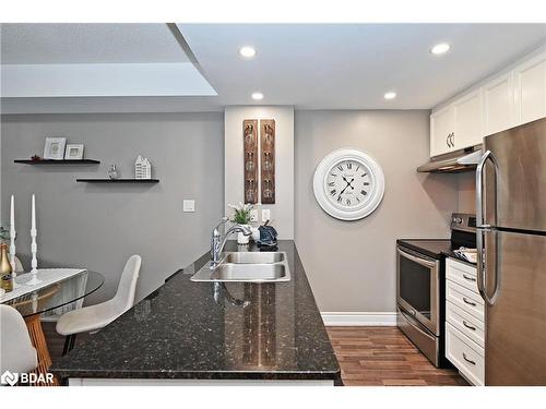 108-149 Church Street, Schomberg, ON - Indoor Photo Showing Kitchen With Double Sink