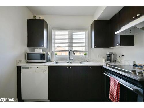 5-25 Madelaine Drive, Barrie, ON - Indoor Photo Showing Kitchen With Double Sink