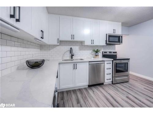 2-83 Westmount Road N, Waterloo, ON - Indoor Photo Showing Kitchen With Stainless Steel Kitchen With Double Sink