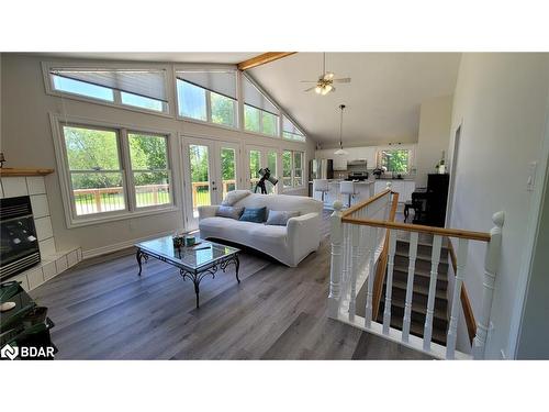 13790 County 27 Road, Springwater, ON - Indoor Photo Showing Living Room With Fireplace