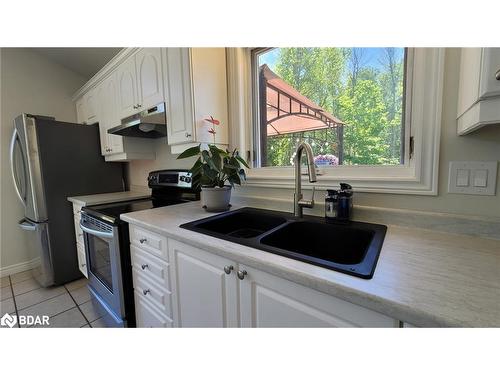 13790 County 27 Road, Springwater, ON - Indoor Photo Showing Kitchen With Double Sink