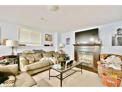 16 Waddington Crescent, Barrie, ON - Indoor Photo Showing Living Room With Fireplace