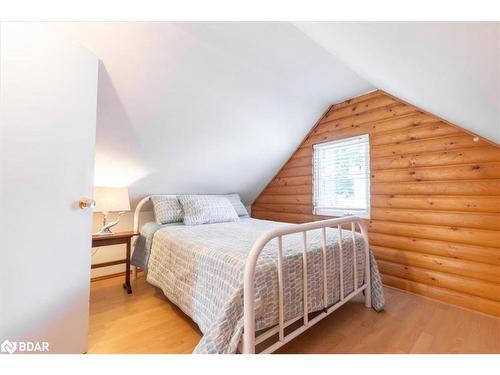 1200 Old Barrie Rd W, Edgar, ON - Indoor Photo Showing Bedroom