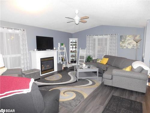 9 Trellis Lane, Innisfil, ON - Indoor Photo Showing Living Room With Fireplace