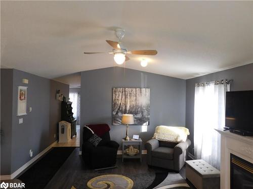 9 Trellis Lane, Innisfil, ON - Indoor Photo Showing Living Room With Fireplace