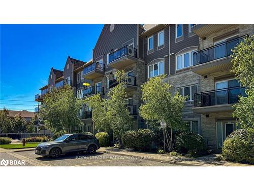 309-5705 Long Valley Road, Mississauga, ON - Outdoor With Balcony With Facade