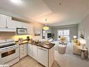 307-91 Raglan Street Street, Collingwood, ON  - Indoor Photo Showing Kitchen With Double Sink 