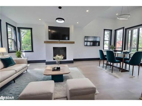 4356 Hepinstall Landing, Washago, ON - Indoor Photo Showing Living Room With Fireplace