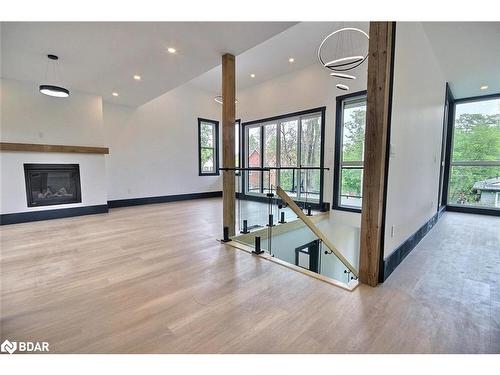 4356 Hepinstall Landing, Washago, ON - Indoor Photo Showing Other Room With Fireplace