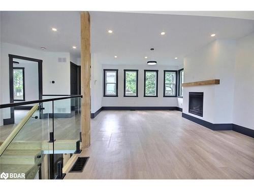 4356 Hepinstall Landing, Washago, ON - Indoor Photo Showing Other Room With Fireplace