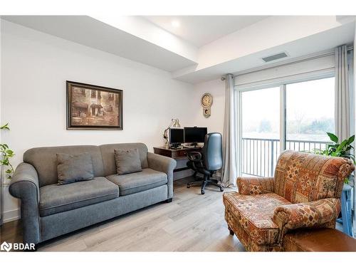 310-10 Culinary Lane, Barrie, ON - Indoor Photo Showing Living Room