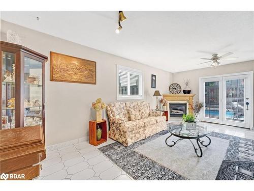 57 Downing Crescent, Barrie, ON - Indoor Photo Showing Living Room With Fireplace