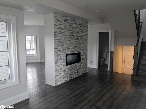 3 Beverly Street, Elmvale, ON - Indoor Photo Showing Living Room With Fireplace