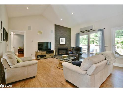 16 Macedonia Circle, Tiny, ON - Indoor Photo Showing Living Room With Fireplace