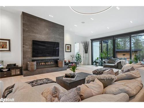 2761 Lockhart Road, Innisfil, ON - Indoor Photo Showing Living Room With Fireplace