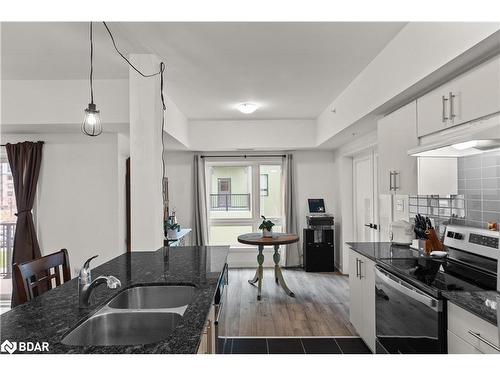 117-4 Spice Way, Barrie, ON - Indoor Photo Showing Kitchen With Double Sink