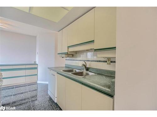 803-20 Cherrytree Drive, Brampton, ON - Indoor Photo Showing Kitchen With Double Sink