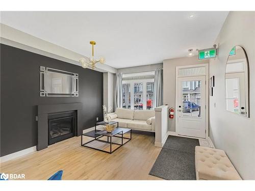 12-218 Crosswinds Boulevard, The Blue Mountains, ON - Indoor Photo Showing Living Room With Fireplace