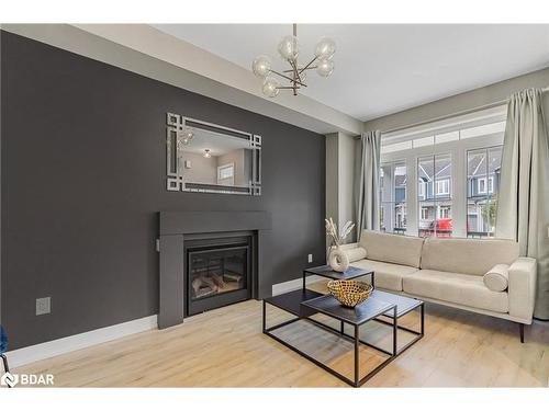 12-218 Crosswinds Boulevard, The Blue Mountains, ON - Indoor Photo Showing Living Room With Fireplace