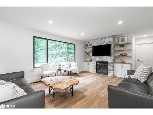 2764 Fairgrounds Road, Severn, ON - Indoor Photo Showing Living Room With Fireplace