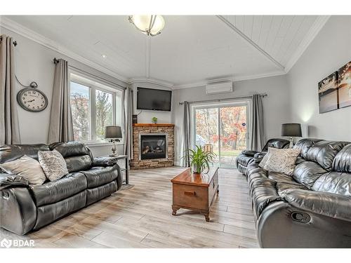 2 Jordan Lane, Huntsville, ON - Indoor Photo Showing Living Room With Fireplace