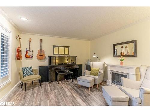 1166 Sunnidale Road, Springwater, ON - Indoor Photo Showing Living Room With Fireplace