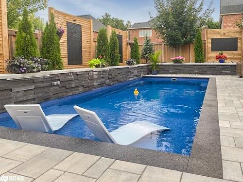 51 Cameron Street, Springwater, ON - Outdoor With In Ground Pool