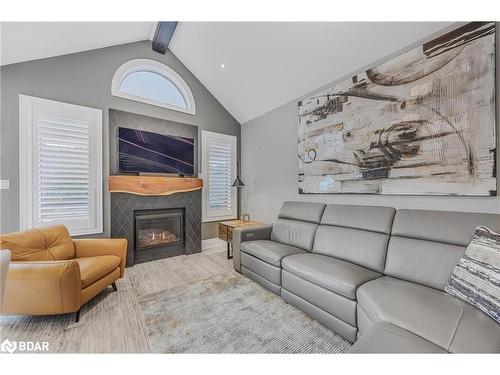 51 Cameron Street, Springwater, ON - Indoor Photo Showing Living Room With Fireplace