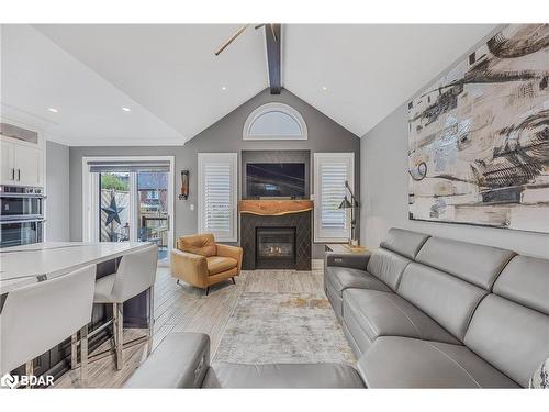 51 Cameron Street, Springwater, ON - Indoor Photo Showing Living Room With Fireplace