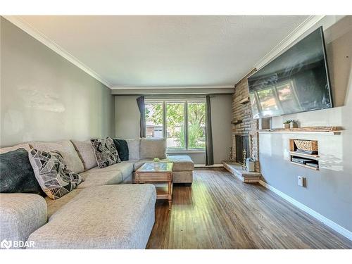 7 Alexander Avenue, Barrie, ON - Indoor Photo Showing Living Room With Fireplace