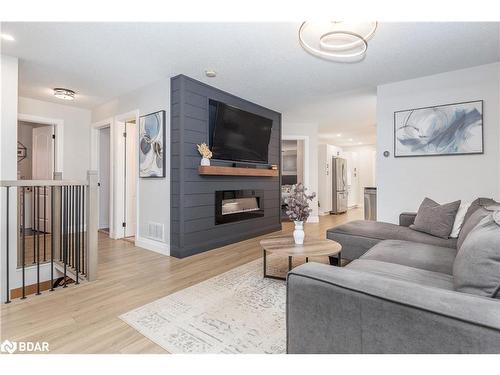 72 Gore Drive, Barrie, ON - Indoor Photo Showing Living Room With Fireplace