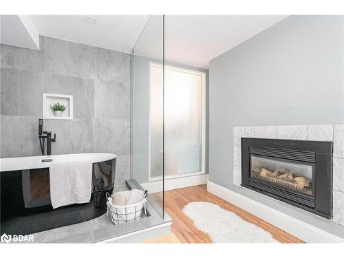 795744 Grey Road 19, The Blue Mountains, ON - Indoor Photo Showing Living Room With Fireplace