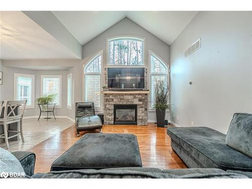 30 Lloyd Cook Drive E, Springwater, ON - Indoor Photo Showing Living Room With Fireplace