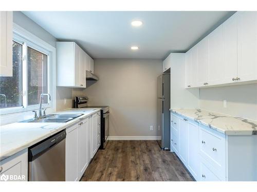 228A Cindy Lane, Essa Township, ON - Indoor Photo Showing Kitchen With Double Sink