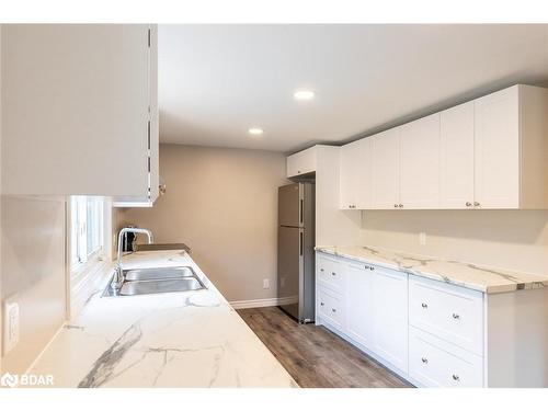 228A Cindy Lane, Essa Township, ON - Indoor Photo Showing Kitchen With Double Sink