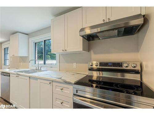 228A Cindy Lane, Essa Township, ON - Indoor Photo Showing Kitchen With Double Sink With Upgraded Kitchen