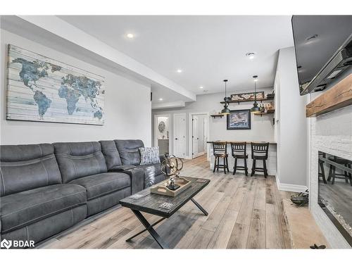 61 Collier Crescent, Angus, ON - Indoor Photo Showing Living Room With Fireplace