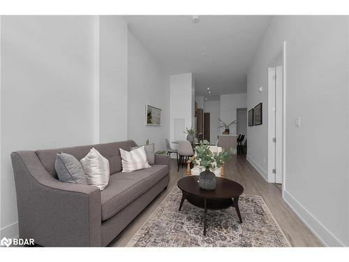 105-185 Dunlop Street E, Barrie, ON - Indoor Photo Showing Living Room