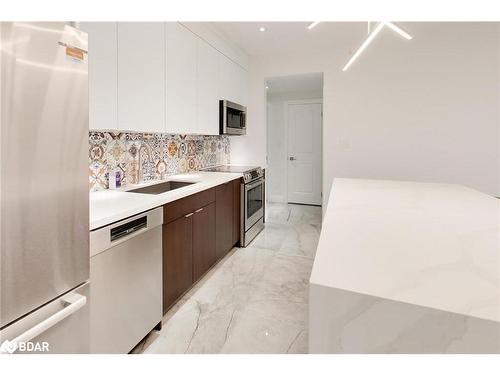 309-295 Cundles Road E, Barrie, ON - Indoor Photo Showing Kitchen