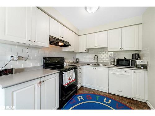 52-239 Ferndale Drive S, Barrie, ON - Indoor Photo Showing Kitchen With Double Sink