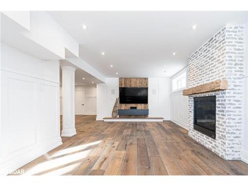 124 Farm Gate Road, The Blue Mountains, ON - Indoor Photo Showing Living Room With Fireplace