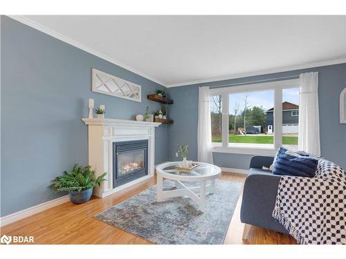 204 Margaret Street, Stayner, ON - Indoor Photo Showing Living Room With Fireplace