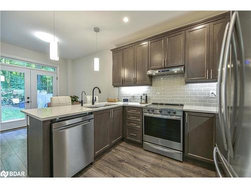 27 Atlantis Drive, Orillia, ON - Indoor Photo Showing Kitchen With Double Sink With Upgraded Kitchen