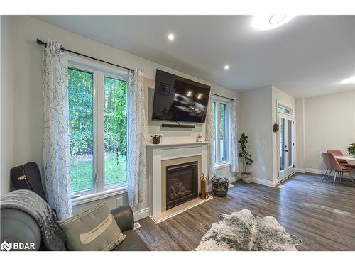 27 Atlantis Drive, Orillia, ON - Indoor Photo Showing Living Room With Fireplace