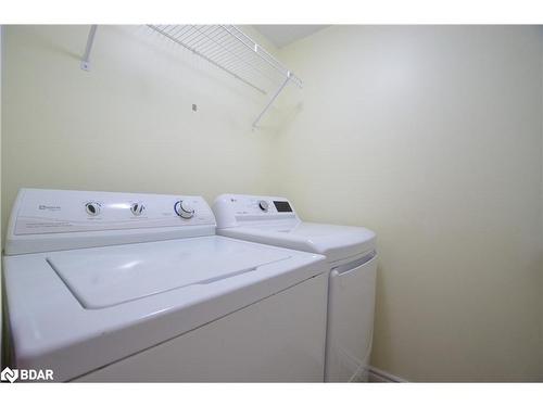 Lower-140 Country Lane, Barrie, ON - Indoor Photo Showing Laundry Room