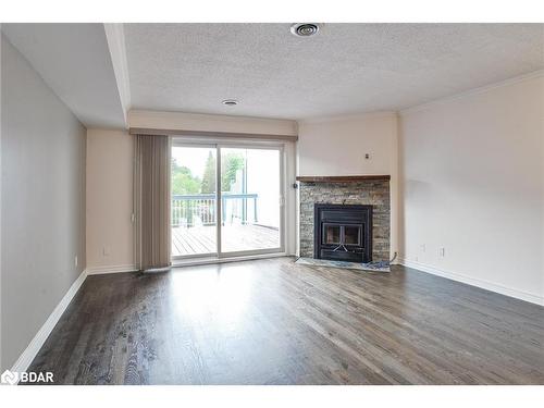 14-30 Laguna Parkway, Brechin, ON - Indoor Photo Showing Living Room With Fireplace