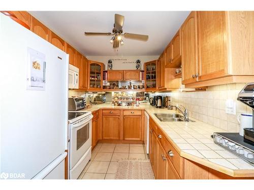 305-131 Clapperton Street, Barrie, ON - Indoor Photo Showing Kitchen With Double Sink