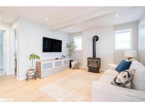 282 Robins Point Road, Tay, ON - Indoor Photo Showing Living Room With Fireplace