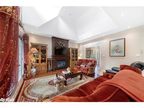 7 Sherwood Crescent, Tiny, ON - Indoor Photo Showing Living Room With Fireplace